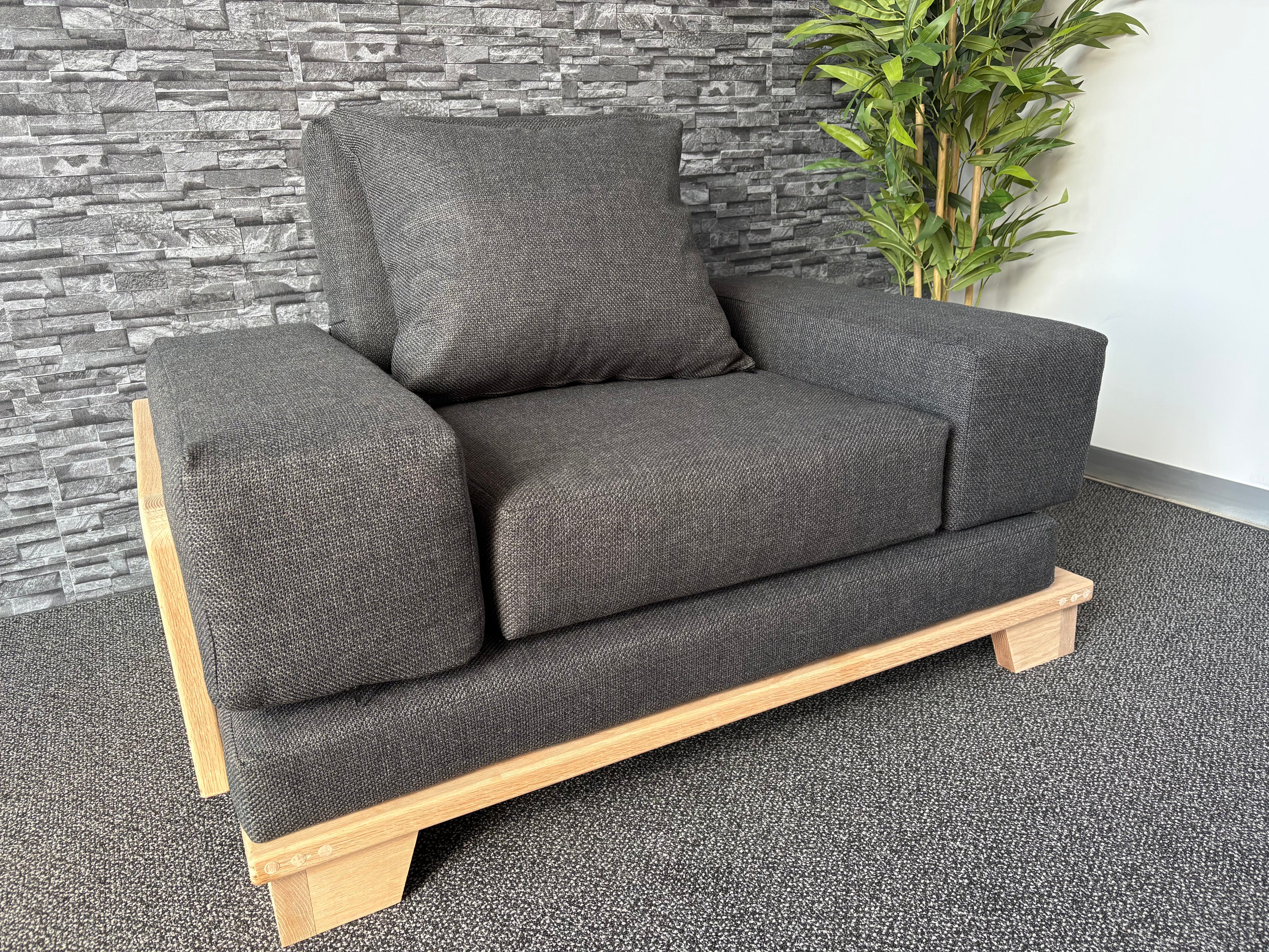 Velorra Glaciella 1-Seater sofa in Glaciella ribbed fabric on a solid Red Oak base