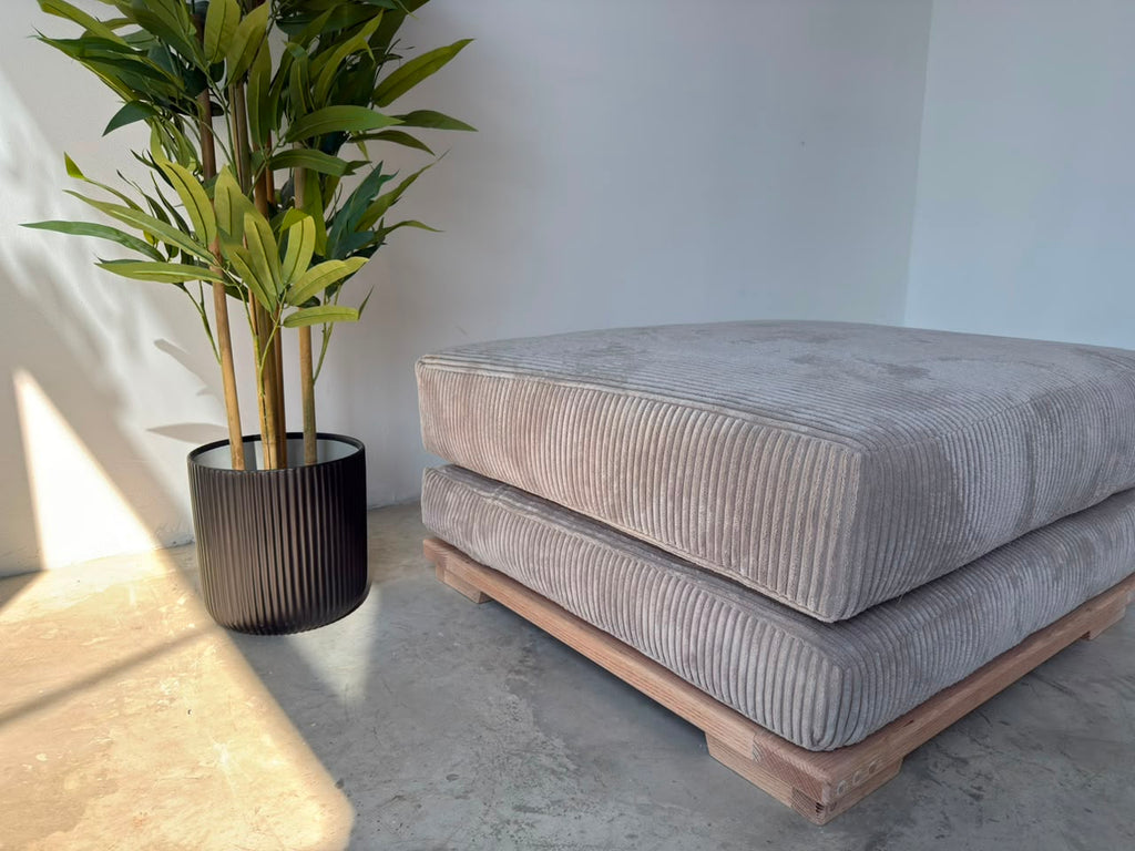 Velorra Luma Ottoman in Luma fabric on a solid Red Oak base